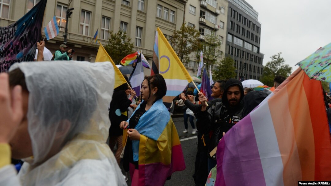 Pride supporters march in the streets of Belgrade on September 17.