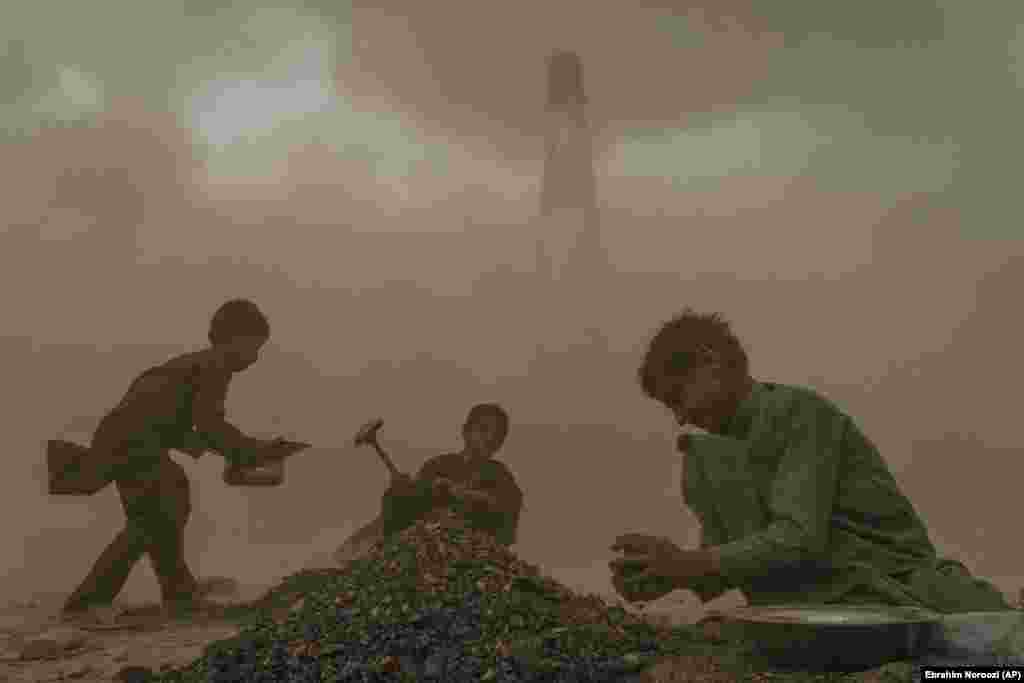 Afghan children work at a brick factory on the outskirts of Kabul.&nbsp;