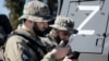 Военнослужащие во время смотра сил чеченских военных подразделений на территории резиденции главы Чечни, 29 марта 2022 года. Иллюстративное фото
