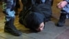 Russian police officers detain a man during an unsanctioned opposition rally in Moscow. (file photo)