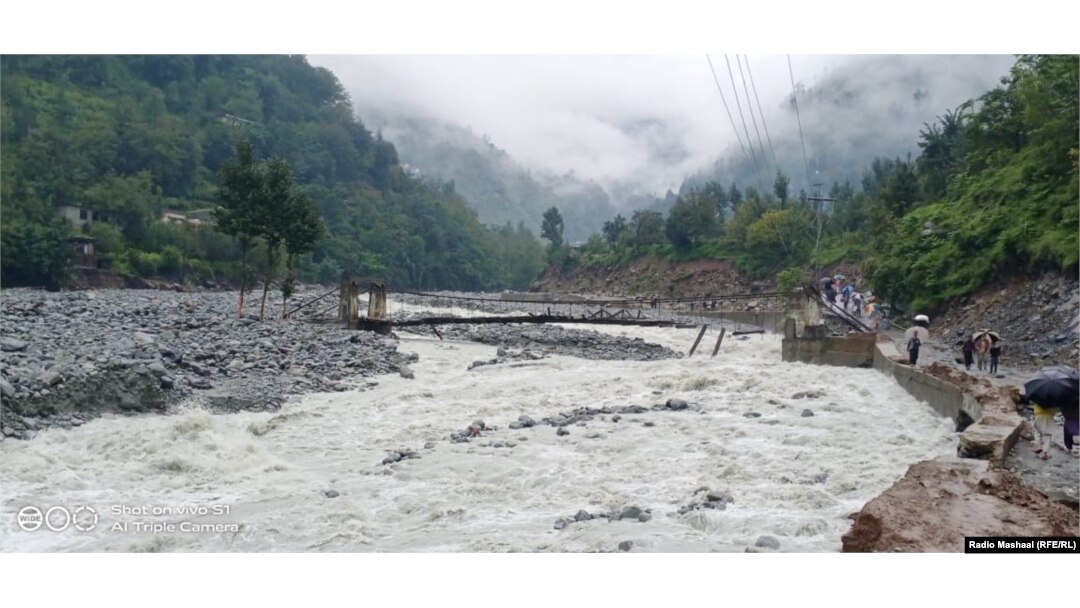 The raging waters of the Bishigram River amid torrential monsoon rains this year.
