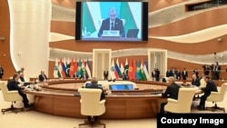 Президенты стран-участниц ШОС на саммите в Самарканде (Узбекистан).