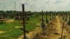 Кладбище в городе Буча, захоронение неопознанных тел граждан, убитых российскими войсками в период оккупации. Киевская область, Украина. Август 2022 года