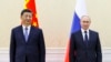 Президент Китая Си Цзиньпин (слева) и президент России Владимир Путин на саммите ШОС в Узбекистане. Самарканд, 15 сентября 2022 года
