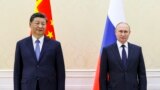 Очільник Китаю Сі Цзіньпін і президент Росії Володимир Путін під час саміту Шанхайської організації співробітництва (ШОС) у Самарканді, Узбекистан. 15 вересня 2022 року