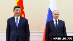 Președintele Chinei, Xi Jinping, alături de omologul său rus, Vladimir Putin, la summitul din Uzbekistan, septembrie 2022.