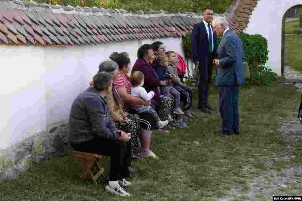 A photo taken in May of then-Prince Charles speaking with locals in Transylvania. Charles first visited Transylvania in 1998 and has said he immediately fell in love with Romania. The British king can trace his lineage back to Vlad Tepes, one of Romania&rsquo;s national heroes who was also known as &ldquo;Vlad the Impaler&rdquo; for his ruthless treatment of enemies.