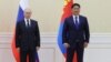 Russian President Vladimir Putin (left) with Mongolian President Ukhnaa Khurelsukh (file photo)