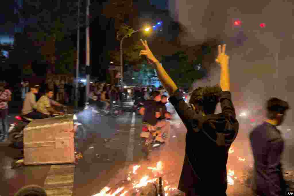 A demonstrator in Tehran joins a wave of nationwide outrage that has spilled into the streets of Iran following the death in custody of a Kurdish woman, Mahsa Amini, who was arrested by the Islamic Republic&#39;s morality police.&nbsp;&nbsp;