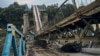 A destroyed bridge in Izyum, Ukraine, on September 13. The latest tranche of the EIB's funding is aimed at helping Ukraine ensure urgent repairs of damaged roads, bridges, and railway infrastructure.