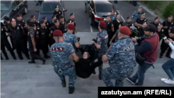 Armenia - Police detain the mother of an Armenian soldier killed in the 2020 war in Nagorno-Karabakh at the Yerablur Military Pantheon, Yerevan, September 21, 2022.