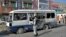 A security personnel visits the site of a blast in Kabul on March 18 that hit a bus carrying government employees.