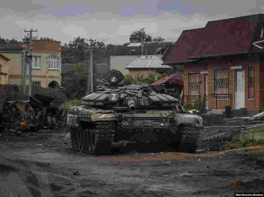 As Russian forces fled, they left behind large quantities of ammunition and hardware such as this tank in Izyum.&nbsp;The loss of Izyum is regarded as a strategic setback for Moscow as its troops had relied on the city as a base and resupply node for its forces in the Kharkiv region.