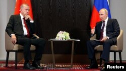 Претседателите на Турција и на Русија, Реџеп Таип Ердоган и Владимир Путин 