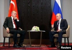Режеп Тайып Эрдоган менен Владимир Путин. Архивдик сүрөт.