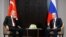 Russian President Vladimir Putin (right) and Turkish President Tayyip Erdogan attend a meeting on the sidelines of the Shanghai Cooperation Organization summit in Samarkand, Uzbekistan, on September 16.
