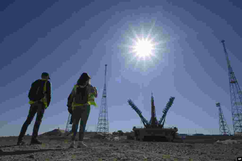 International observers gathered at Baikonur to document the Soyuz launch, part of a spacecraft seat exchange program between NASA and the Russian space program. Previously, NASA had paid for places on the Soyuz but the current arrangement involves no transfer of funds, according to U.S. government sources.