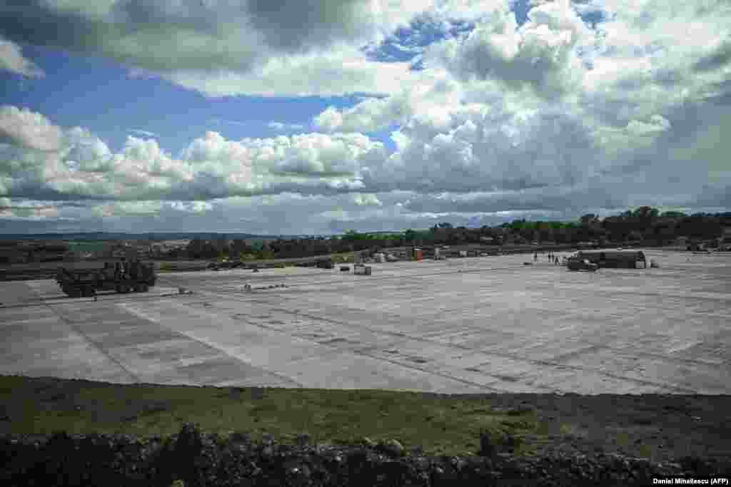 A massive concrete area under construction at the Cincu training site. According to Minguet, the base will allow &quot;the creation of a permanent, stronger battalion, with more heavy weapons, to prevent any aggression or any destabilization in Romania.&quot; He added, &quot;I think we will be here for a period of four-five years.&quot;