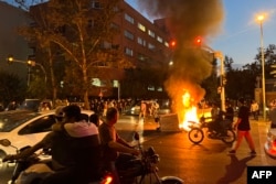 Protestele au devenit violente, iar forțele de ordine au atacat protestatarii. Teheran, 19 septembrie.