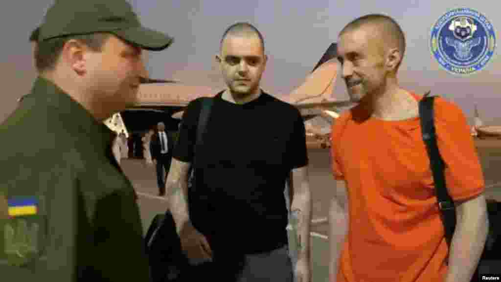 Briton Aiden Aslin (center) was among a group of prisoners who were released from Russia and flown to Riyadh, Saudi Arabia, under the terms of the exchange deal, in which Turkey was a key negotiator. &nbsp;