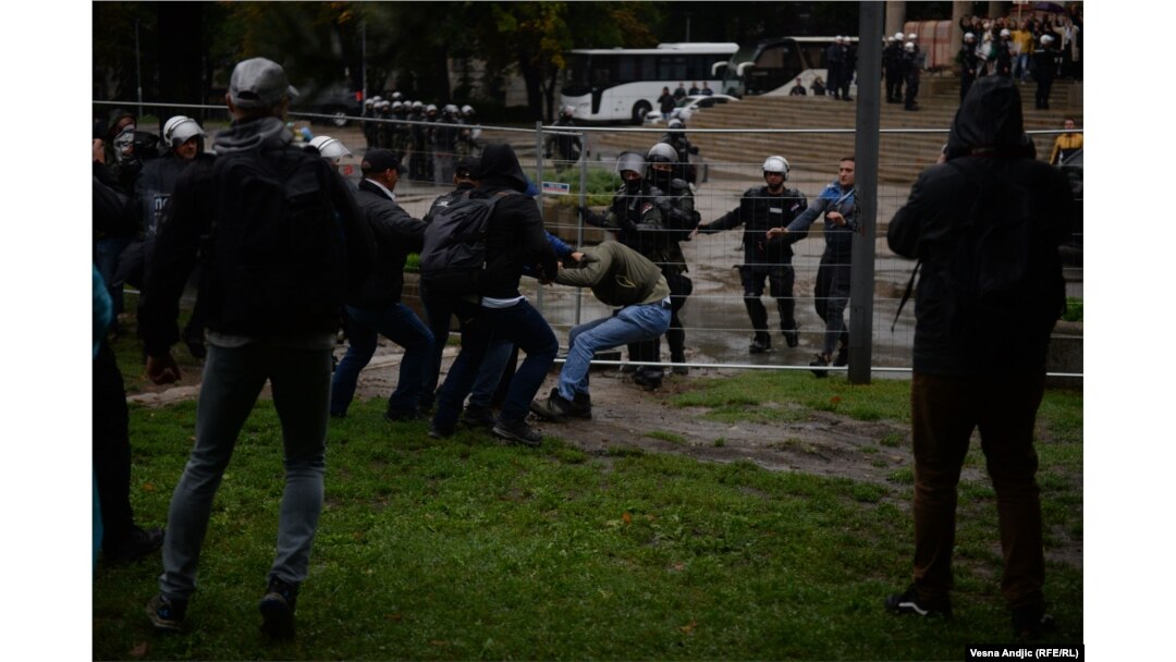 Police said 31 people were detained after anti-gay activists threw bottles at police and tried to cross police cordons.