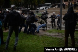 Police said 31 people were detained after anti-gay activists threw bottles at police and tried to cross police cordons.