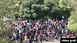 Tehran University students protest against the killing of Mahsa Amini on September 19.