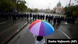 Serbian riot police line up to prevent anti-gay protesters from clashing with participants in the EuroPride walk in Belgrade on September 17.