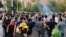 Протести в Ірані почалися 16 вересня після повідомлення про смерті 22-річної Махси Аміні у лікарні, куди її привезди з черепно-мозковою травмою з поліцейського відділку. Тегеран, 19 вересня
