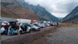 Long lines of cars have been lining up to cross into Georgia from Russia in recent days. 