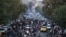 Iranian demonstrators take to the streets of the capital Tehran in September 2022 during a protest for Mahsa Amini, days after she died in police custody.