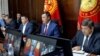 Kyrgyz President Sadyr Japarov (center) called for "patience and peace," claiming that "manipulative" information is being posted online to "disrupt friendly ties with Kyrgyzstan's neighbors."