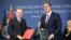 Turkish President Recep Tayyip Erdogan (left) and Serbian President Aleksandar Vucic pose during a signing ceremony in Belgrade on October 10.