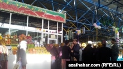 Customers queue for fresh meat in Ashgabat.