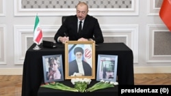 Azerbaijani President Ilham Aliyev visits the Iranian Embassy in Baku on March 4. 