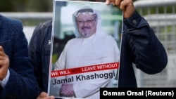 A demonstrator holds a picture of Saudi journalist Jamal Khashoggi during a protest in front of Saudi Arabia's consulate in Istanbul earlier this month.