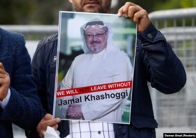 A demonstrator holds a picture of Saudi journalist Jamal Khashoggi during a protest in front of the consulate in Istanbul last month.