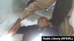 Раненый после нападения смертника в провинции Кунар, Афганистан, 27 февраля 2016