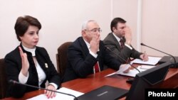 Armenia - Central Election Commission (CEC) Chairman Tigran Mukuchian (C) and other members of the CEC approve the final results of the February 18 presidential election, Yerevan, 25Feb2013.