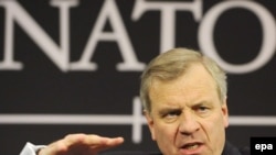 NATO Secretary-General Jaap de Hoop Scheffer speaks at a press conference in Brussels on March 5