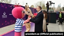 Azerbaijan - President Ilham Aliyev joins Novruz (Norouz) festivities in Baku with his wife Mehriban, Baku, 19 March 2015.