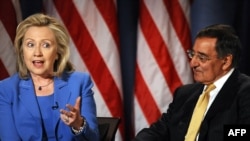 U.S. Secretary of State Hillary Clinton and Defense Secretary Leon Panetta during a conversation hosted by the National Defense University and CNN in Washington on August 16