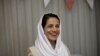 Lawyer and human rights defender Nasrin Sotoudeh smiles at her home in Tehran, September 18, 2013. File photo