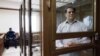 Український журналіст Роман Сущенко у суді в день винесення вироку, Москва, 4 червня. Його засудили до 12 років позбавлення волі