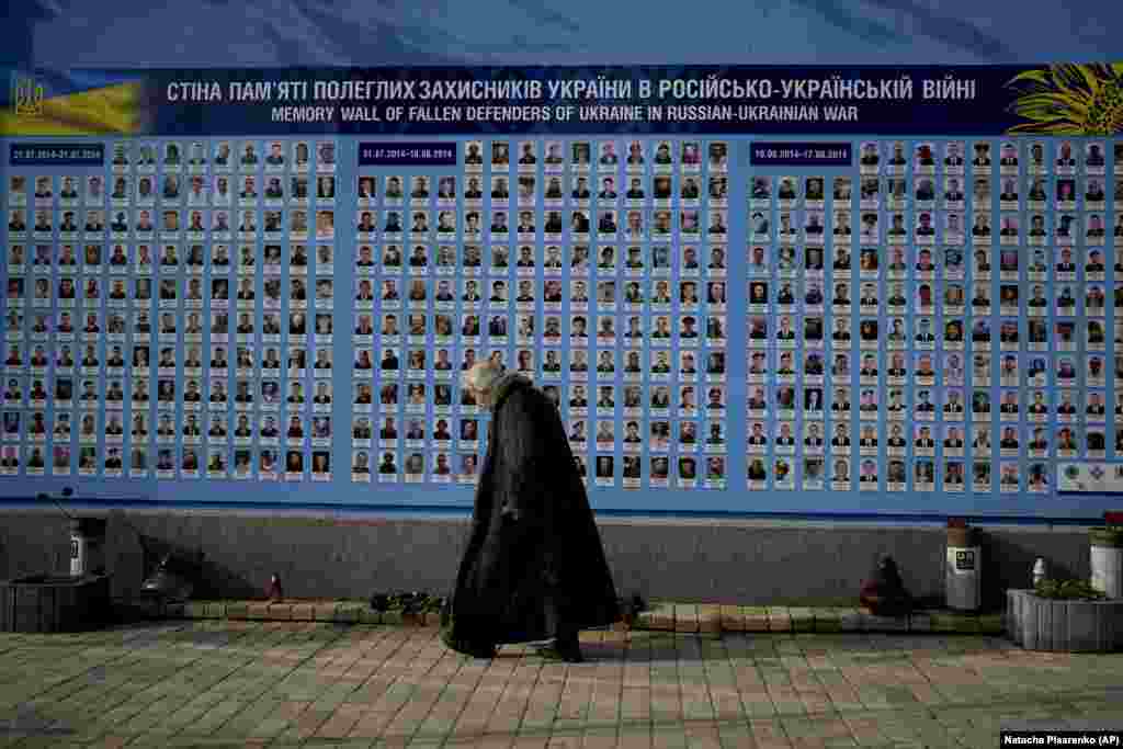 A wall of portraits of fallen Ukrainian soldiers in Kyiv on May 23.