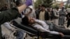 یکی از قربانیان حملات بمی اخیر در شمال افغانستان 