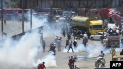 د ۳۰۲۳ز کال د مې پر نهمه د عمران خان تر نیول کېدو وروسته له تشدده ډکو احتجاجونو یو عکس. 