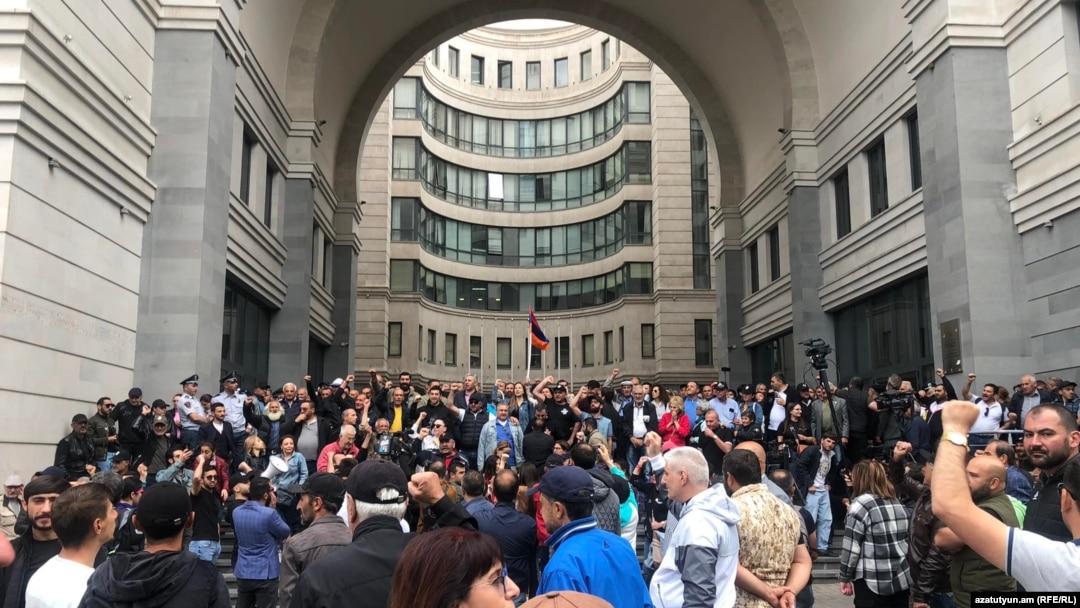 Opposition protesters block the entrances of the building of the Foreign Ministry in Yerevan on May 24.