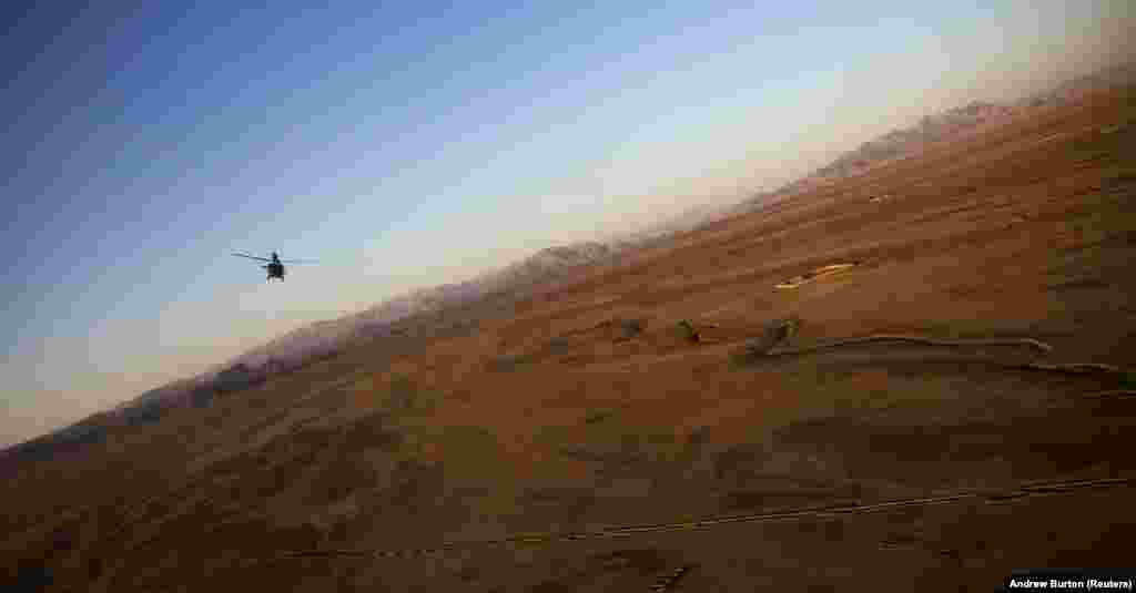 A U.S. Army Blackhawk helicopter flies above Kandahar Province in Afghanistan. (Reuters/Andrew Burton)