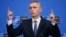 NATO Secretary-General Jens Stoltenberg talks to reporters ahead of a defense ministers meeting at NATO headquarters in Brussels on February 12.